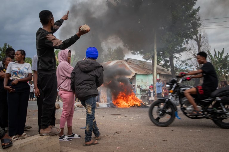 People protest in the streets of Arusha, Tanzania, on election day Wednesday, Oct. 29, 2025. (AP Photo/str)