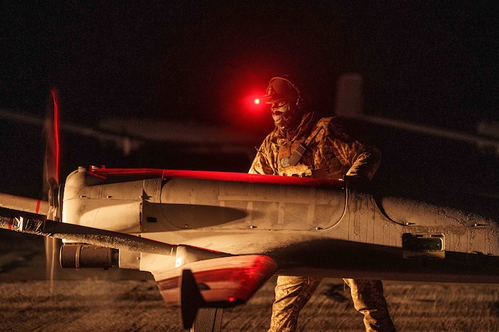 A Ukrainian serviceman of the 14th Separate Unmanned Aerial Systems Regiment prepares a long-range drone.