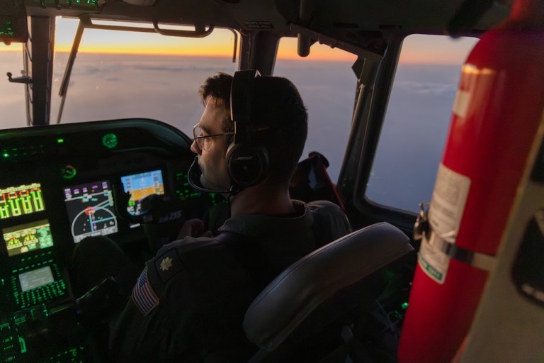Pilot in Command Lt. Tyler Henning flies a HC-144B Maritime Patrol Aircraft off the coast of Padre Island, Texas.