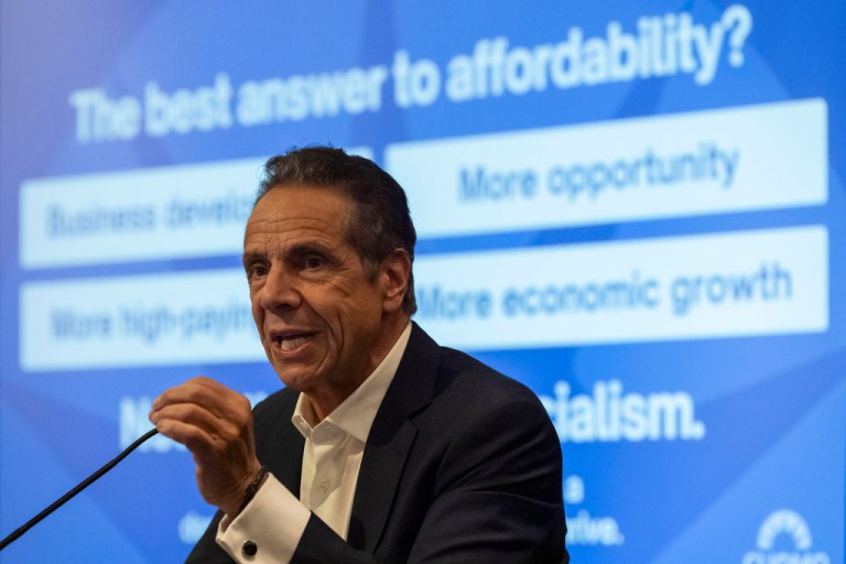 Andrew Cuomo speaks about affordability to reporters.