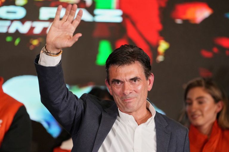The winner of the 2025 Bolivian presidential election celebrates.
