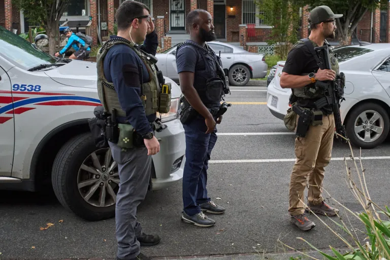 Federal agents stand by in an operation in Washington D.C.