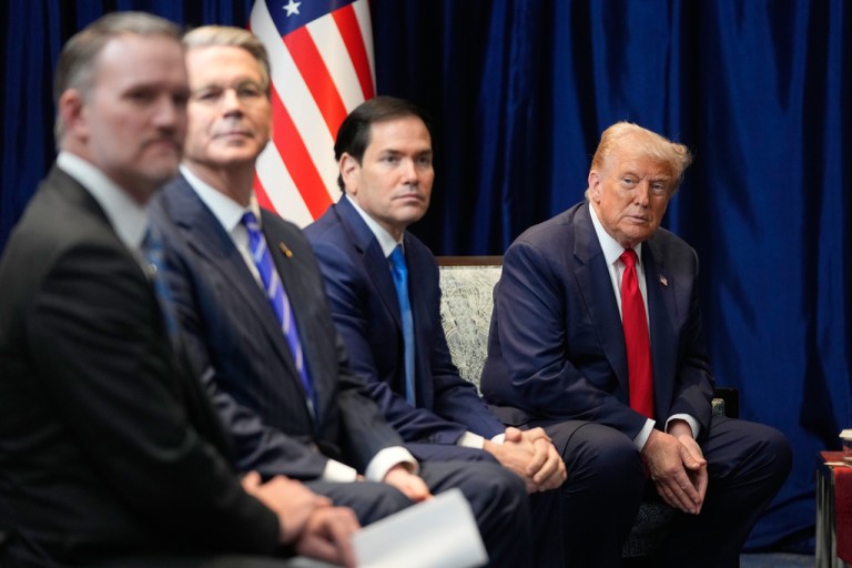 Donald Trump sits with Marco Rubio, Scott Bessent and other members of his administration at ASEAN.