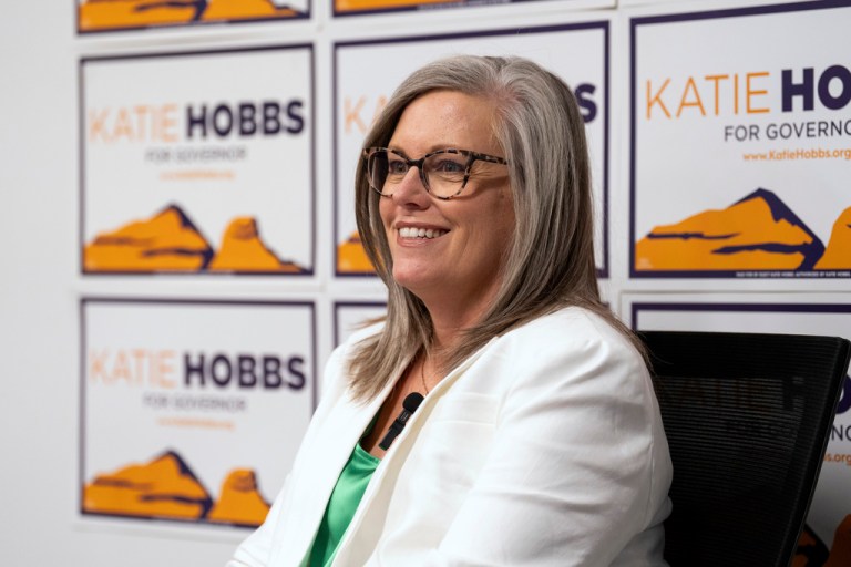 Katie Hobbs speaks with reporters.