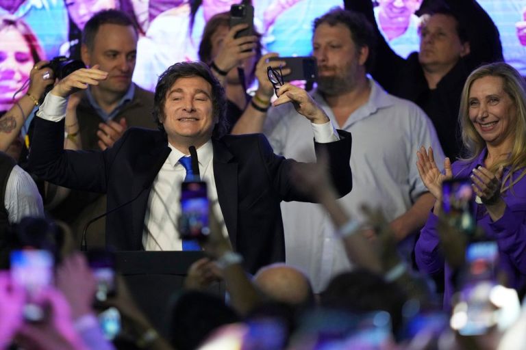 Milei is seen celebrating after a dominant win in the midterm elections.