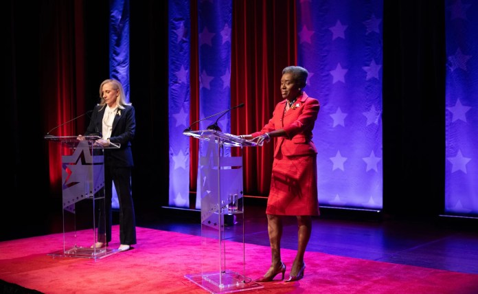 Winsome Earle-Sears (at right) turns to ask Abigail Spanberger a question during their debate at Norfolk State University on Oct. 9, 2025. (WAVY-TV.)