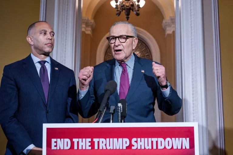 Senate Minority Leader Chuck Schumer (D-NY) speaks during a press conference as House Minority Leader Hakeem Jeffries (D-NY) listens.