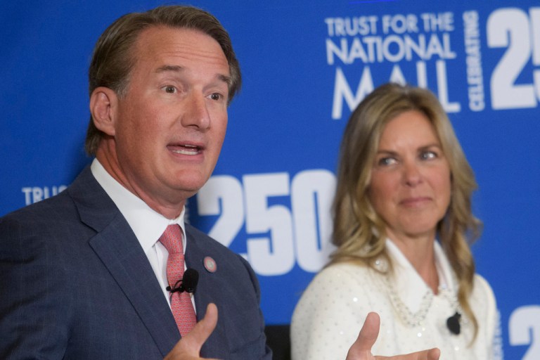 Glenn Youngkin speaks with the First Lady of Virginia alongside him