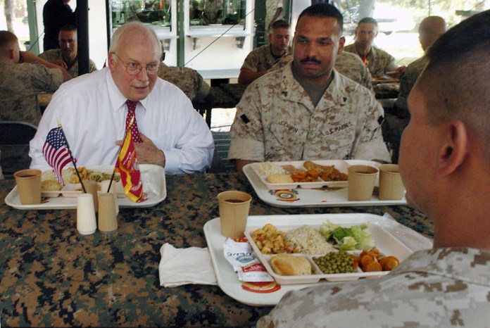FILE- Vice President Dick Cheney talks with a Marine and Cpl. Todd J. Corbin, right, of Sandusky Ohio, during a luncheon with marines from the 3rd Battalion, 25th Marine Regiment in an outdoor field house on Monday, Oct. 3, 2005 at Camp Lejeune, NC.