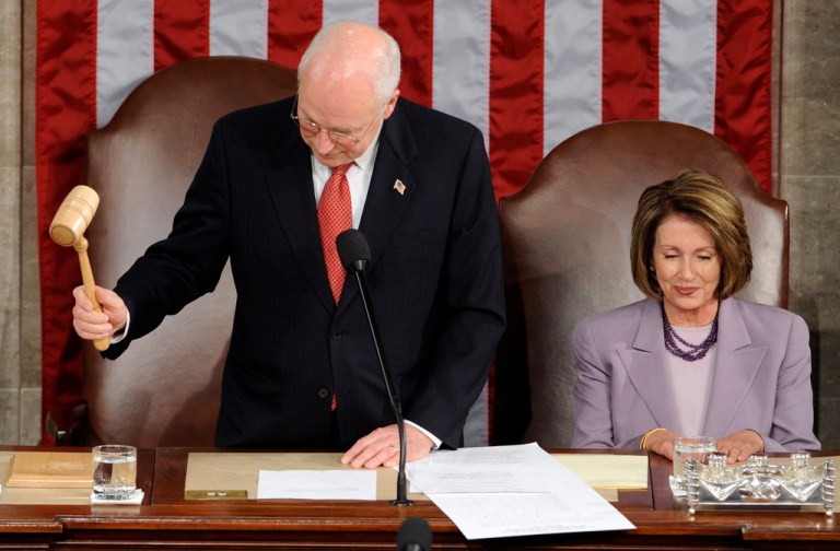 Vice President Dick Cheney, accompanied by House Speaker Nancy Pelosi (D-CA), bangs a gavel.