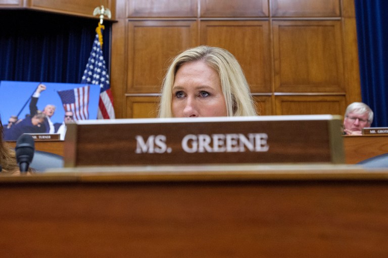 FILE - Rep. Marjorie Taylor-Greene, R-Ga., listens during a hearing