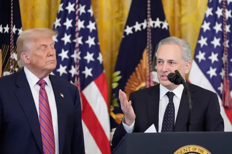White House AI and crypto czar David Sacks speaks as President Donald Trump listens at an event for the signing of the GENIUS Act.