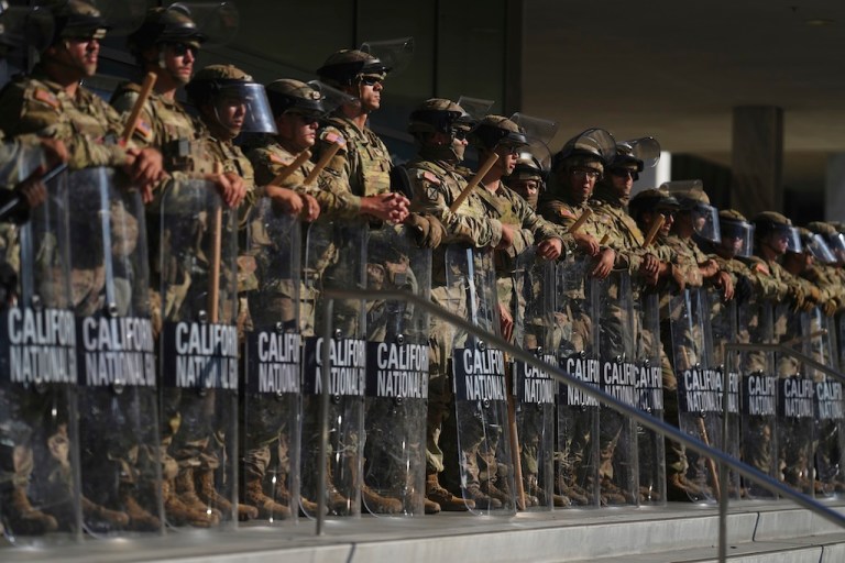 California National Guard members are positioned at the Federal Building in downtown Los Angeles.