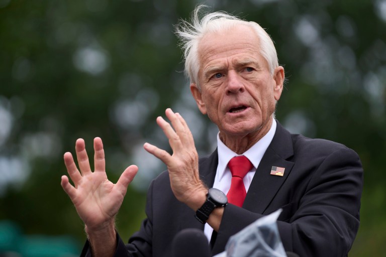 White House trade counselor Peter Navarro speaks with reporters at the White House, Thursday, Aug. 21, 2025, in Washington. (AP Photo/Evan Vucci)