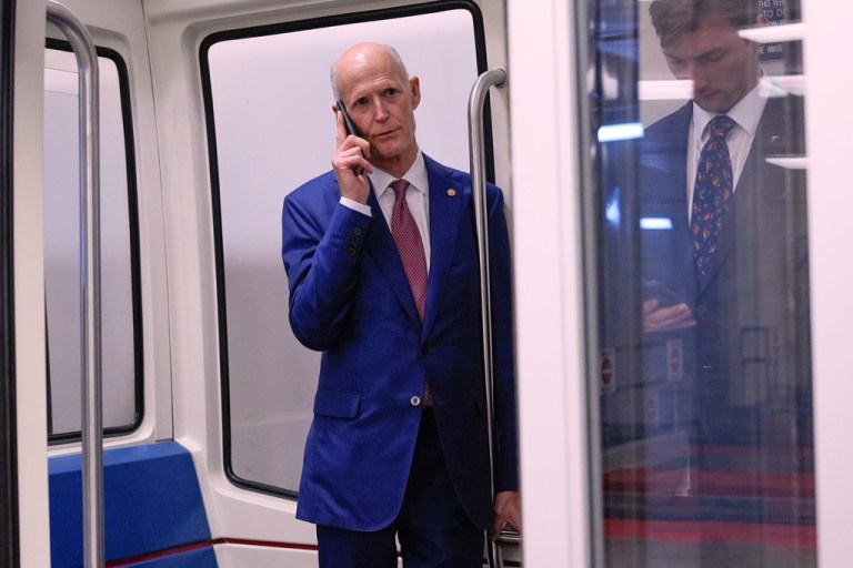 Sen. Rick Scott (R-FL) talks on the phone.