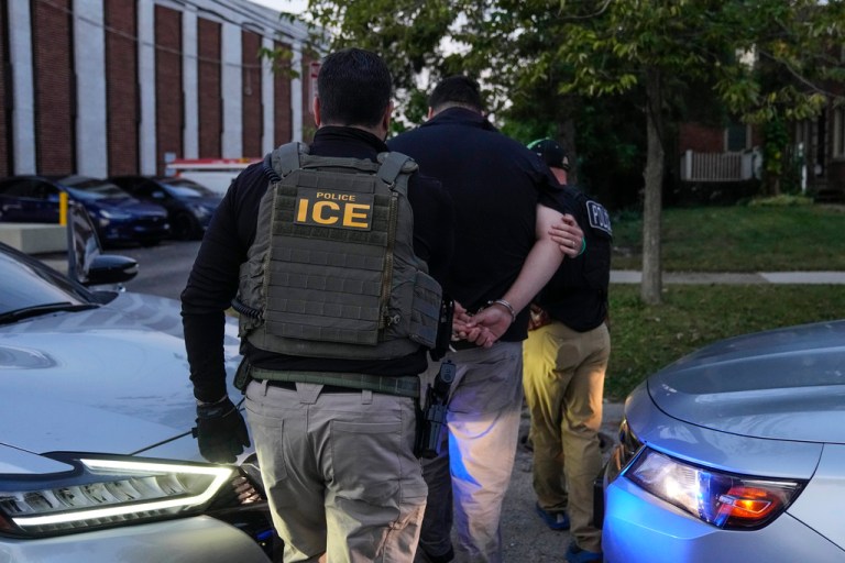 Immigration and Customs Enforcement agents make an arrest.