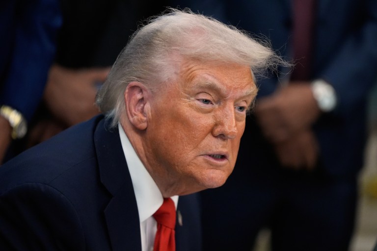 President Donald Trump answers questions from reporters during a Diwali celebration in the Oval Office at the White House, Tuesday, Oct. 21, 2025, in Washington. (AP Photo/Manuel Balce Ceneta)