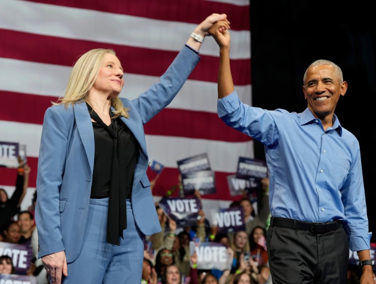 Virginia Democratic gubernatorial candidate Abigail Spanberger joins former President Barack Obama, during a campaign event Saturday, Nov. 1, 2025, in Norfolk, Va.