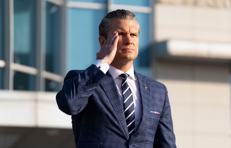 Pete Hegseth salutes as he and South Korean Defense Minister Ahn Gyu-back inspect a guard of honor during a welcoming ceremony prior to the 57rd Security Consultative Meeting (SCM), at the defense ministry in Seoul, South Korea.