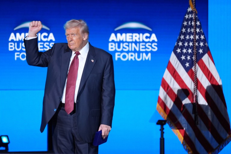 President Donald Trump arrives to speak at the America Business Forum, Wednesday, Nov. 5, 2025, in Miami. (AP Photo/Rebecca Blackwell)