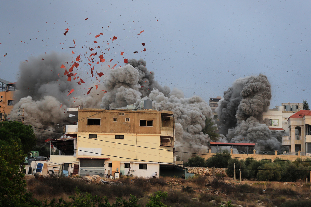 Israel revives strikes on Hezbollah after warning it is rearming