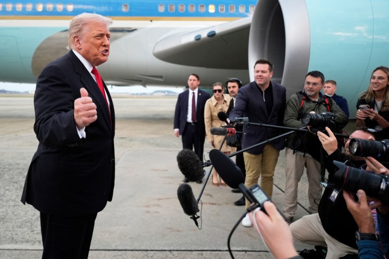 President Donald Trump speaks with reporters upon arriving on Air Force One at Joint Base Andrews, Md., Sunday, Nov. 9, 2025, on his way to attend a football game between the Washington Commanders and the Detroit Lions in Maryland
