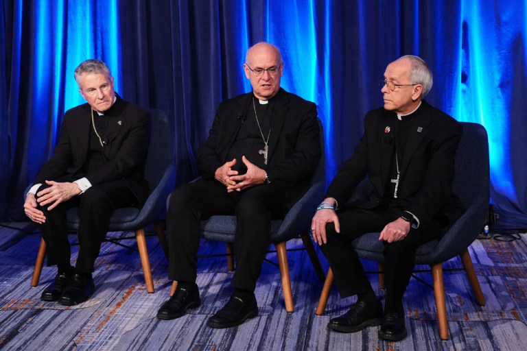 From left, Archbishop Timothy Broglio, Bishop Kevin C. Rhoades and Bishop Mark J. Seitz.