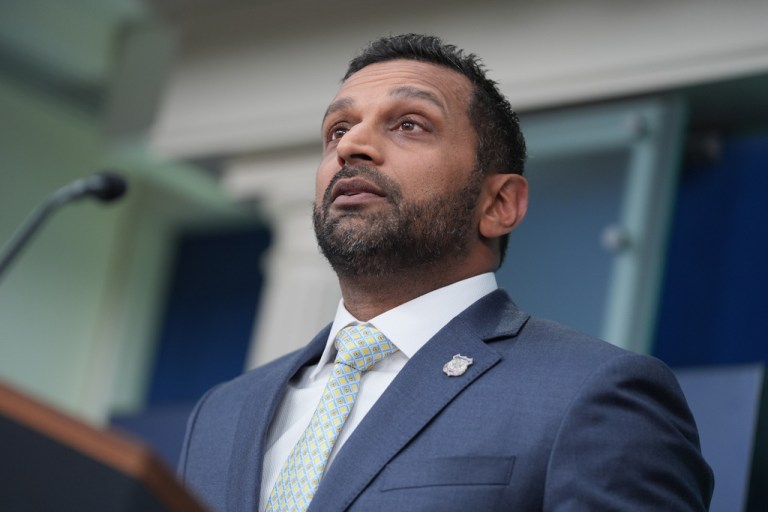 BI Director Kash Patel speaks to reporters.