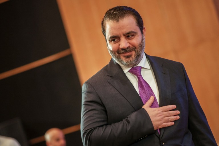 Syria's Foreign Minister Asaad al-Shibani attends the opening session of a series of meetings between representatives of Syria's civil society, in the presence of European Union and transitional government officials, at a conference center on the southern outskirts of Damascus, Saturday, Nov. 15, 2025.