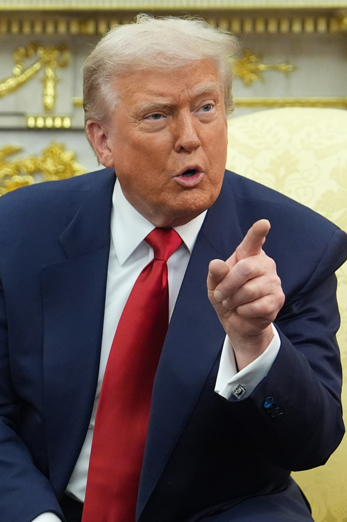 President Donald Trump points as he meets Saudi Arabia's Crown Prince Mohammed bin Salman in the Oval Office of the White House, Tuesday, Nov. 18, 2025, in Washington. (AP Photo/Evan Vucci)