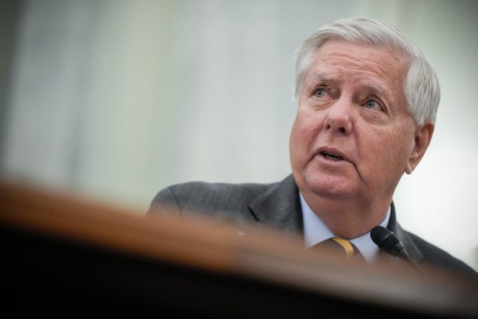 Sen. Lindsey Graham, R-S.C., introduces Adm. Kevin Lunday, acting commandant of the U.S. Coast Guard, during a Senate Commerce, Science and Transportation Committee hearing on the nomination Lunday for Commandant of the Coast Guard, Wednesday, Nov. 19, 2025, on Capitol Hill in Washington