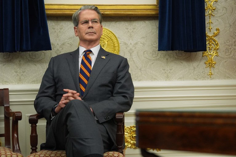 Treasury Secretary Scott Bessent listens as President Donald Trump talks after meeting with New York Mayor-elect Zohran Mamdani in the Oval Office of the White House, Friday, Nov. 21, 2025, in Washington. (AP Photo/Evan Vucci)