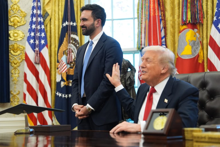 President Donald Trump pats New York City Mayor-elect Zohran Mamdani's arm in the Oval Office of the White House.