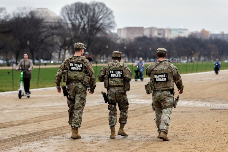 National Guard troops patrol the National Mall.