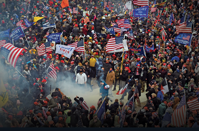 Trump supporters clash with police as they storm the Capitol in Washington, Jan. 6, 2021. (Roberto Schmidt/AFP/Getty Images)