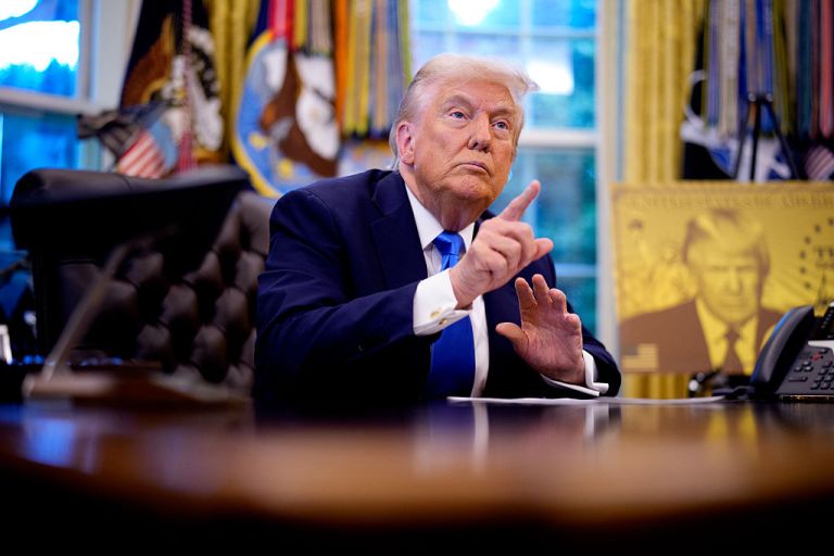 President Donald Trump takes a question from a reporter before signing executive orders in the Oval Office at the White House on September 19, 2025 in Washington, DC. Trump signed two executive orders, establishing the 