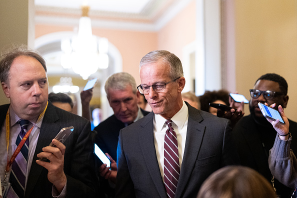 Senate Majority Leader John Thune (R-SD) speaks to reporters outside of his office in the Capitol.