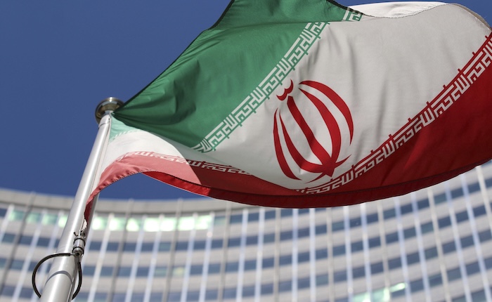 The Iranian flag flies in front of a U.N. building.
