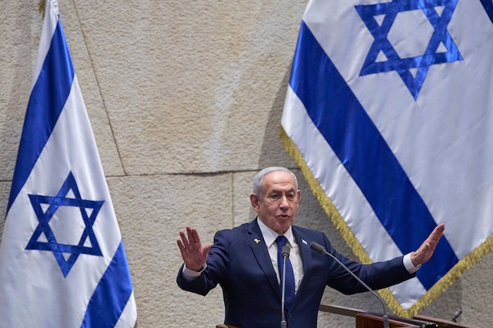 Israeli Prime Minister Benjamin Netanyahu addresses lawmakers in the Knesset, Israel's Parliament.