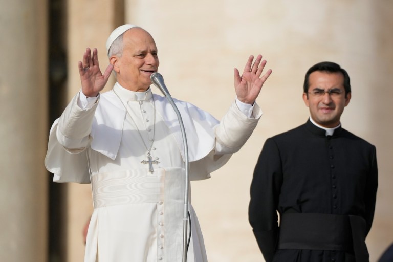 Pope Leo XIV waves to faithful before presiding over special mass for the Jubilee of the poor, in St. Peter's Square at The Vatican, Sunday, Nov.16, 2025. (AP Photo/Gregorio Borgia)