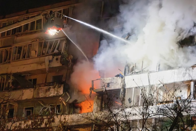 Firefighters put out the fire after a drone hit a multi-storey residential building during Russia’s night drone attack in Kyiv, Ukraine, Tuesday, Nov. 25, 2025. (AP Photo/Efrem Lukatsky)