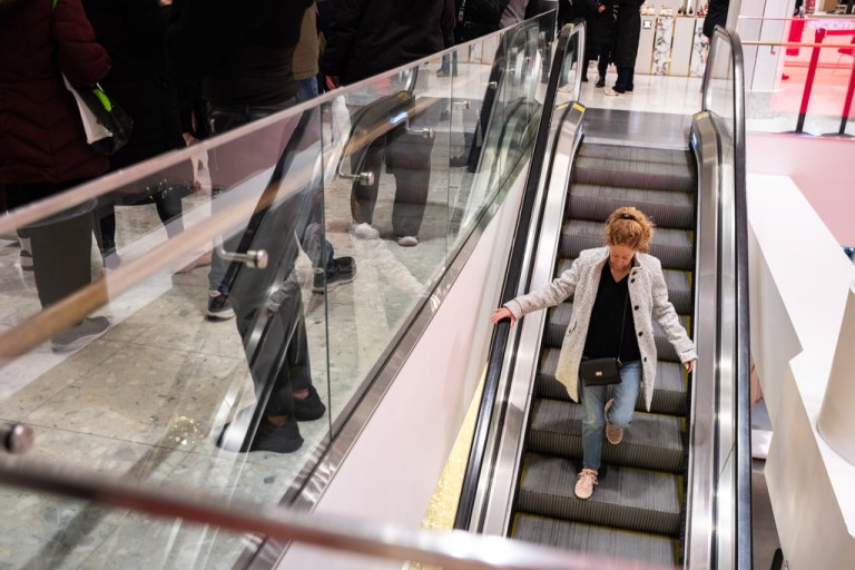Black Friday Shoppers enter Macy's flagship store at opening time in New York on Friday, Nov. 28, 2025. (AP Photo/Angelina Katsanis)