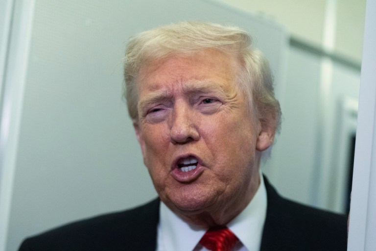 President Donald Trump speaks to reporters.