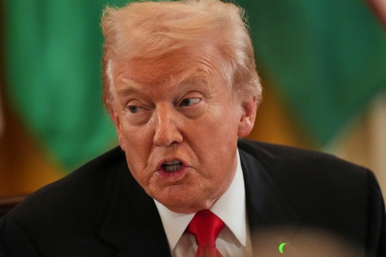 President Donald Trump speaks at a dinner.