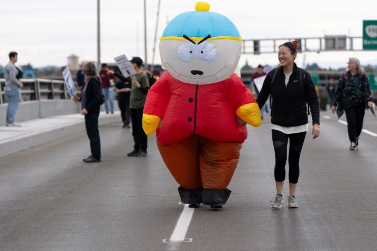 A protester in a South Park costume.