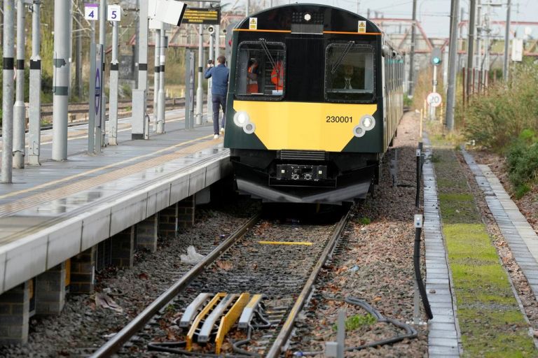 A train arrives at a station near London.