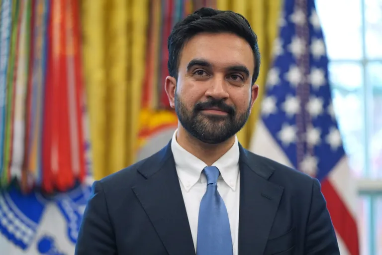 New York Mayor-elect Zohran Mamdani listens as President Donald Trump speaks in the Oval Office.