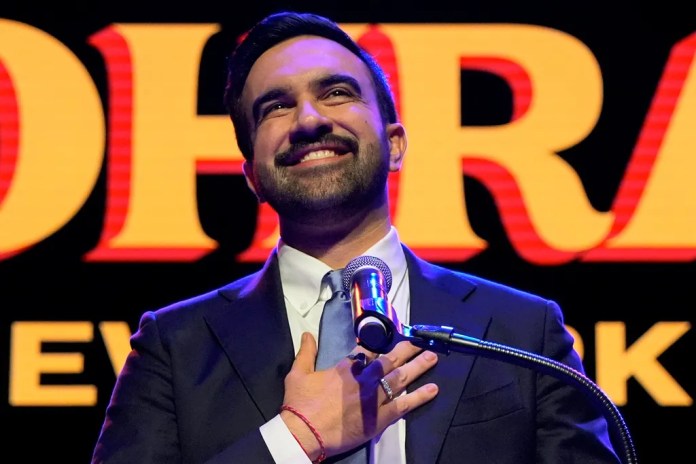 Zohran Mamdani holds his hand to his chest after he wins the NYC mayoral race.