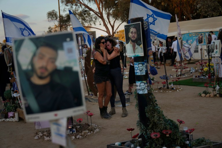 People visit the site of the Nova music festival, where hundreds of revelers were killed and abducted by Hamas and taken into Gaza