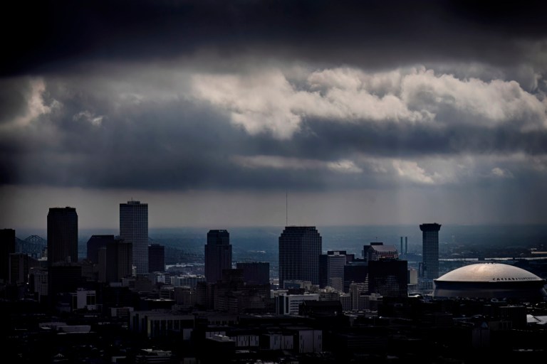 Caesars Superdome against the New Orleans skyline.